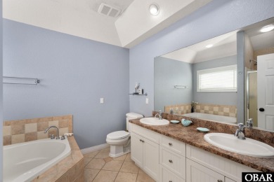 This vacation rental home is a spacious 4-bedroom, 4.5-bathroom on The Currituck Golf Club in North Carolina - for sale on GolfHomes.com, golf home, golf lot