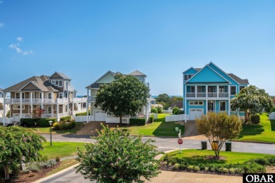 This vacation rental home is a spacious 4-bedroom, 4.5-bathroom on The Currituck Golf Club in North Carolina - for sale on GolfHomes.com, golf home, golf lot