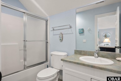 This vacation rental home is a spacious 4-bedroom, 4.5-bathroom on The Currituck Golf Club in North Carolina - for sale on GolfHomes.com, golf home, golf lot