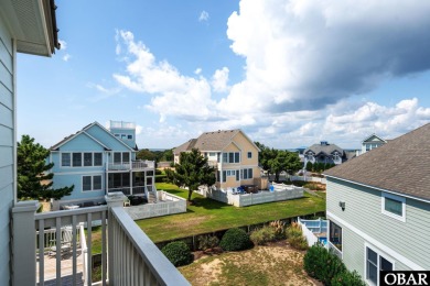 This vacation rental home is a spacious 4-bedroom, 4.5-bathroom on The Currituck Golf Club in North Carolina - for sale on GolfHomes.com, golf home, golf lot