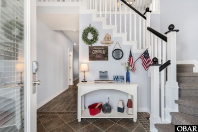 This vacation rental home is a spacious 4-bedroom, 4.5-bathroom on The Currituck Golf Club in North Carolina - for sale on GolfHomes.com, golf home, golf lot