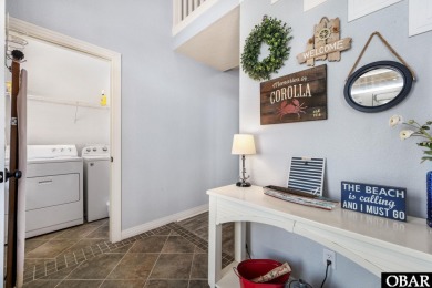 This vacation rental home is a spacious 4-bedroom, 4.5-bathroom on The Currituck Golf Club in North Carolina - for sale on GolfHomes.com, golf home, golf lot