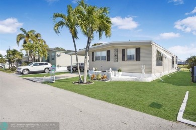 Welcome to your stunning 2-bedroom, 2-bath mobile home in the on Davie Golf Club in Florida - for sale on GolfHomes.com, golf home, golf lot