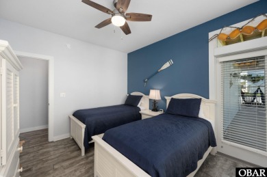 This vacation rental home is a spacious 4-bedroom, 4.5-bathroom on The Currituck Golf Club in North Carolina - for sale on GolfHomes.com, golf home, golf lot