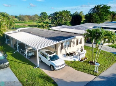 Welcome to your stunning 2-bedroom, 2-bath mobile home in the on Davie Golf Club in Florida - for sale on GolfHomes.com, golf home, golf lot