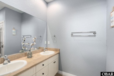 This vacation rental home is a spacious 4-bedroom, 4.5-bathroom on The Currituck Golf Club in North Carolina - for sale on GolfHomes.com, golf home, golf lot