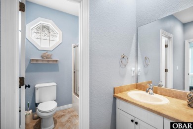 This vacation rental home is a spacious 4-bedroom, 4.5-bathroom on The Currituck Golf Club in North Carolina - for sale on GolfHomes.com, golf home, golf lot