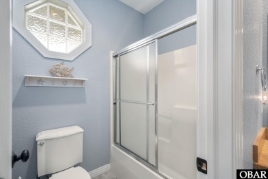 This vacation rental home is a spacious 4-bedroom, 4.5-bathroom on The Currituck Golf Club in North Carolina - for sale on GolfHomes.com, golf home, golf lot