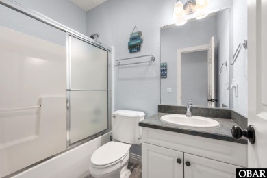 This vacation rental home is a spacious 4-bedroom, 4.5-bathroom on The Currituck Golf Club in North Carolina - for sale on GolfHomes.com, golf home, golf lot