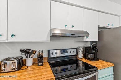 Discover Your Fully Furnished Island Haven with Direct Beach on Founders Club At St. James Plantation in North Carolina - for sale on GolfHomes.com, golf home, golf lot