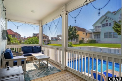 This vacation rental home is a spacious 4-bedroom, 4.5-bathroom on The Currituck Golf Club in North Carolina - for sale on GolfHomes.com, golf home, golf lot