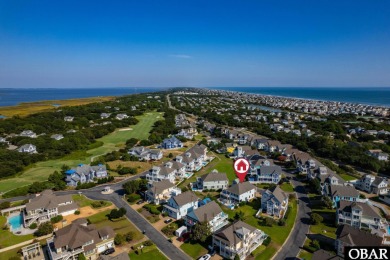 This vacation rental home is a spacious 4-bedroom, 4.5-bathroom on The Currituck Golf Club in North Carolina - for sale on GolfHomes.com, golf home, golf lot