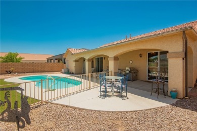 Located at 5832 S Wishing Well Dr, Fort Mohave, Arizona, this on Desert Lakes Golf Course in Arizona - for sale on GolfHomes.com, golf home, golf lot