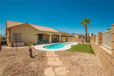 Located at 5832 S Wishing Well Dr, Fort Mohave, Arizona, this on Desert Lakes Golf Course in Arizona - for sale on GolfHomes.com, golf home, golf lot