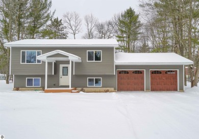 Discover your dream home! This beautifully renovated property on Twin Birch Golf Club in Michigan - for sale on GolfHomes.com, golf home, golf lot