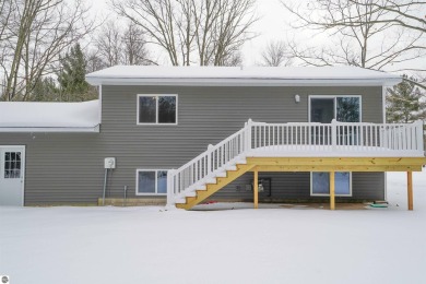 Discover your dream home! This beautifully renovated property on Twin Birch Golf Club in Michigan - for sale on GolfHomes.com, golf home, golf lot