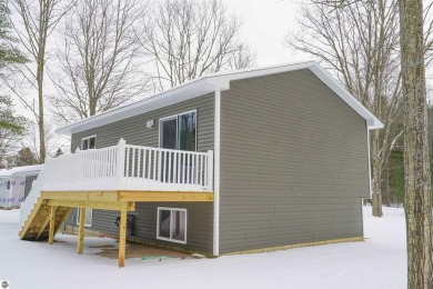 Discover your dream home! This beautifully renovated property on Twin Birch Golf Club in Michigan - for sale on GolfHomes.com, golf home, golf lot