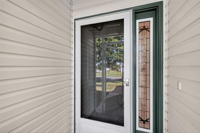 FABULOUS TURNKEY 3/2 San Miguel (Wisteria/Jasmine) with SCREENED on El Diablo Executive Golf Course in Florida - for sale on GolfHomes.com, golf home, golf lot