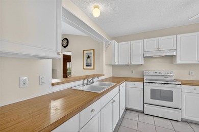 FABULOUS TURNKEY 3/2 San Miguel (Wisteria/Jasmine) with SCREENED on El Diablo Executive Golf Course in Florida - for sale on GolfHomes.com, golf home, golf lot