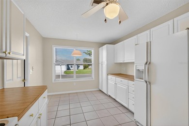 FABULOUS TURNKEY 3/2 San Miguel (Wisteria/Jasmine) with SCREENED on El Diablo Executive Golf Course in Florida - for sale on GolfHomes.com, golf home, golf lot