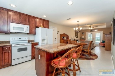 Discover the perfect blend of comfort and style in this on South Padre Island Golf Club in Texas - for sale on GolfHomes.com, golf home, golf lot