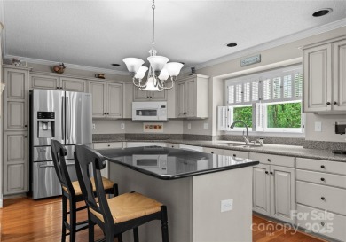 Nestled on a quiet cul-de-sac  backing up to the scenic Raintree on Raintree Country Club in North Carolina - for sale on GolfHomes.com, golf home, golf lot