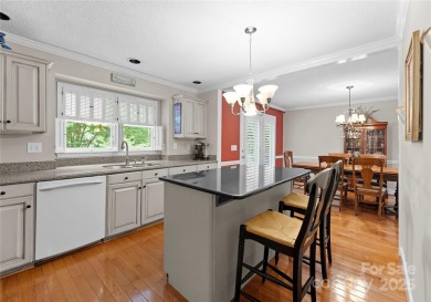 Nestled on a quiet cul-de-sac  backing up to the scenic Raintree on Raintree Country Club in North Carolina - for sale on GolfHomes.com, golf home, golf lot