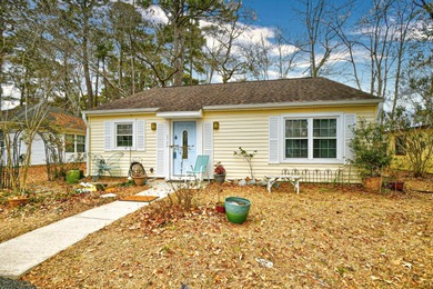 Discover easy coastal living in this beautifully maintained on Heron Point Golf Club in South Carolina - for sale on GolfHomes.com, golf home, golf lot