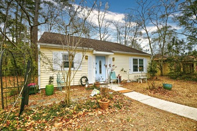 Discover easy coastal living in this beautifully maintained on Heron Point Golf Club in South Carolina - for sale on GolfHomes.com, golf home, golf lot