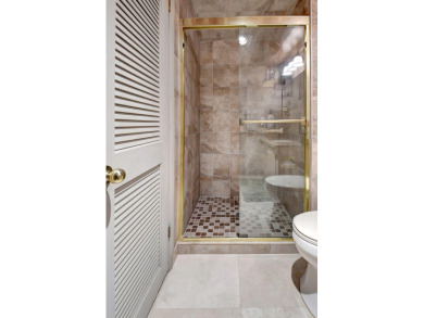 This beautiful 2nd floor corner unit in Fairways Green, Boca on Boca Lago Golf and Country Club in Florida - for sale on GolfHomes.com, golf home, golf lot