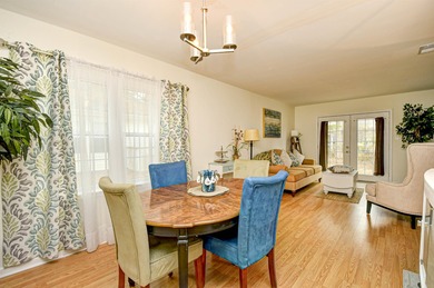 Discover easy coastal living in this beautifully maintained on Heron Point Golf Club in South Carolina - for sale on GolfHomes.com, golf home, golf lot