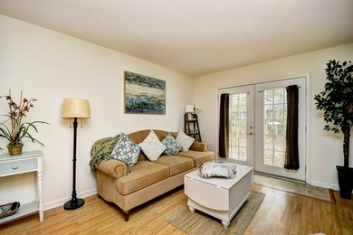 Discover easy coastal living in this beautifully maintained on Heron Point Golf Club in South Carolina - for sale on GolfHomes.com, golf home, golf lot