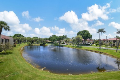 This beautiful 2nd floor corner unit in Fairways Green, Boca on Boca Lago Golf and Country Club in Florida - for sale on GolfHomes.com, golf home, golf lot