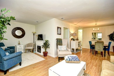 Discover easy coastal living in this beautifully maintained on Heron Point Golf Club in South Carolina - for sale on GolfHomes.com, golf home, golf lot