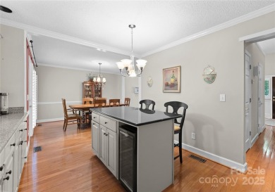 Nestled on a quiet cul-de-sac  backing up to the scenic Raintree on Raintree Country Club in North Carolina - for sale on GolfHomes.com, golf home, golf lot