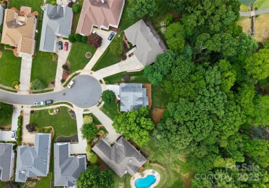 Nestled on a quiet cul-de-sac  backing up to the scenic Raintree on Raintree Country Club in North Carolina - for sale on GolfHomes.com, golf home, golf lot