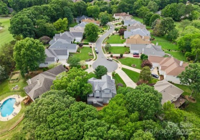 Nestled on a quiet cul-de-sac  backing up to the scenic Raintree on Raintree Country Club in North Carolina - for sale on GolfHomes.com, golf home, golf lot