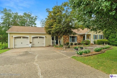 Experience tranquility and comfort in Brandenburg's premier on Doe Valley Country Club in Kentucky - for sale on GolfHomes.com, golf home, golf lot
