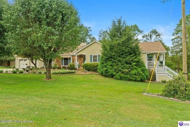 Experience tranquility and comfort in Brandenburg's premier on Doe Valley Country Club in Kentucky - for sale on GolfHomes.com, golf home, golf lot