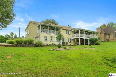 Experience tranquility and comfort in Brandenburg's premier on Doe Valley Country Club in Kentucky - for sale on GolfHomes.com, golf home, golf lot