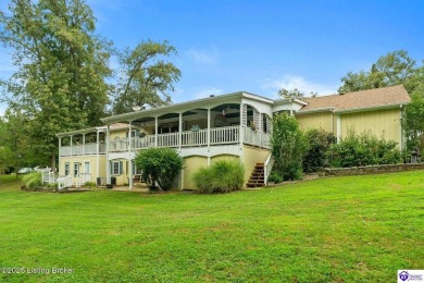 Experience tranquility and comfort in Brandenburg's premier on Doe Valley Country Club in Kentucky - for sale on GolfHomes.com, golf home, golf lot
