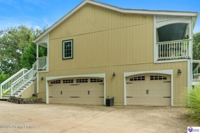 Experience tranquility and comfort in Brandenburg's premier on Doe Valley Country Club in Kentucky - for sale on GolfHomes.com, golf home, golf lot