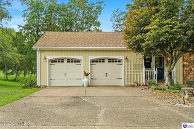 Experience tranquility and comfort in Brandenburg's premier on Doe Valley Country Club in Kentucky - for sale on GolfHomes.com, golf home, golf lot