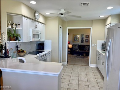 Stunning Lake Views from this Golf Village Carriage Home on Lexington Country Club in Florida - for sale on GolfHomes.com, golf home, golf lot