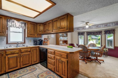 This one's been loved and it shows. Solid all brick home with on Horton Smith Golf Course in Missouri - for sale on GolfHomes.com, golf home, golf lot