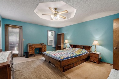 This one's been loved and it shows. Solid all brick home with on Horton Smith Golf Course in Missouri - for sale on GolfHomes.com, golf home, golf lot