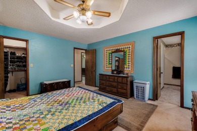 This one's been loved and it shows. Solid all brick home with on Horton Smith Golf Course in Missouri - for sale on GolfHomes.com, golf home, golf lot