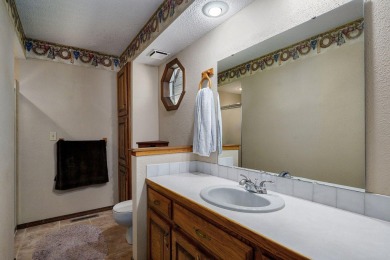 This one's been loved and it shows. Solid all brick home with on Horton Smith Golf Course in Missouri - for sale on GolfHomes.com, golf home, golf lot