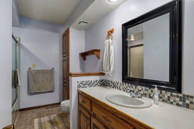 This one's been loved and it shows. Solid all brick home with on Horton Smith Golf Course in Missouri - for sale on GolfHomes.com, golf home, golf lot