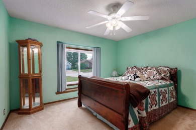 This one's been loved and it shows. Solid all brick home with on Horton Smith Golf Course in Missouri - for sale on GolfHomes.com, golf home, golf lot